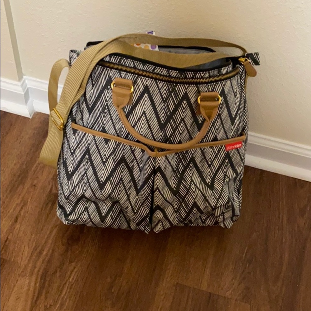 UNUSED diaper bag filled with unused baby stuff